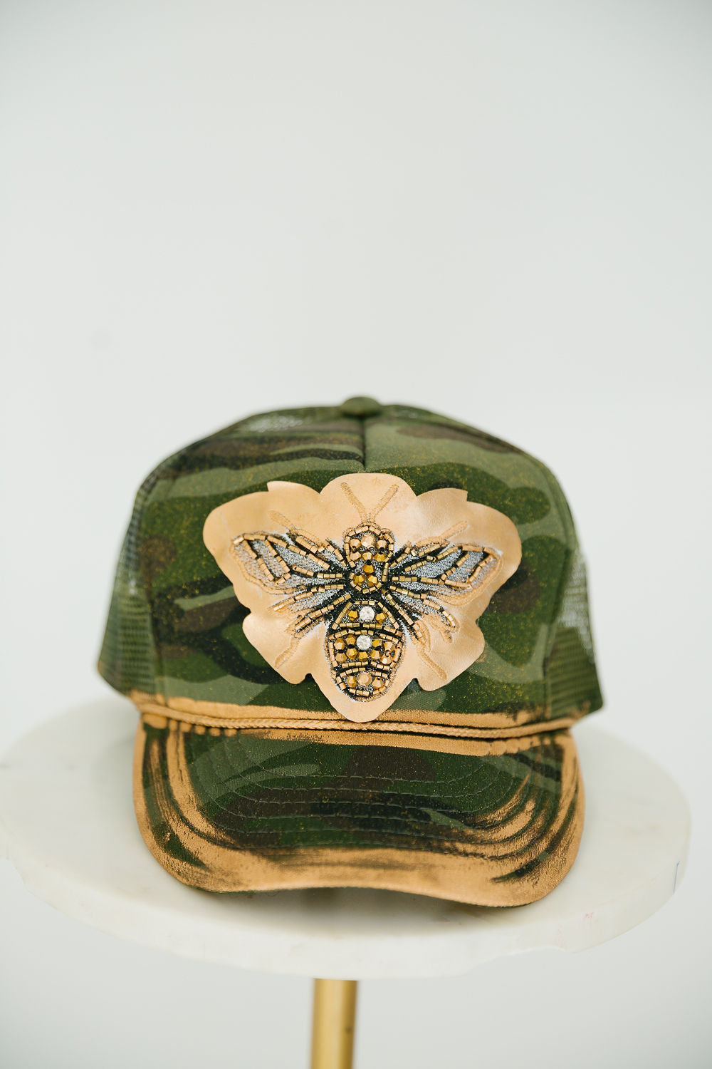 QUEEN BEE CAMO TRUCKER HAT TRUCKER HAT Judith March