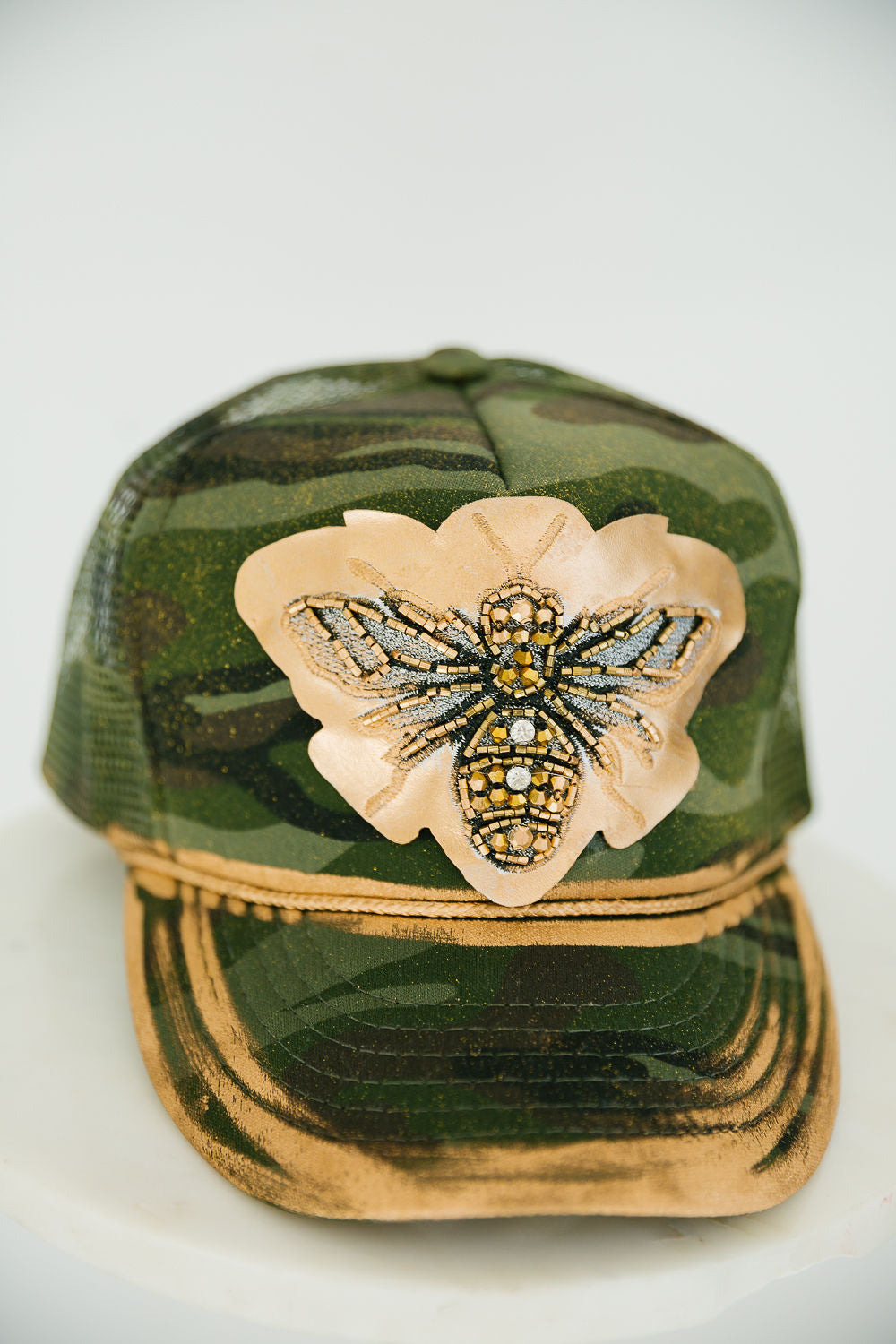 QUEEN BEE CAMO TRUCKER HAT TRUCKER HAT Judith March