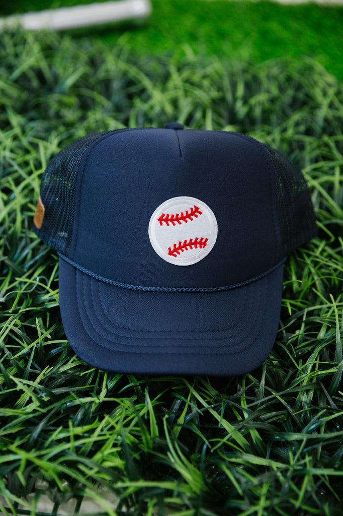 Kids navy trucker hat with a baseball patch