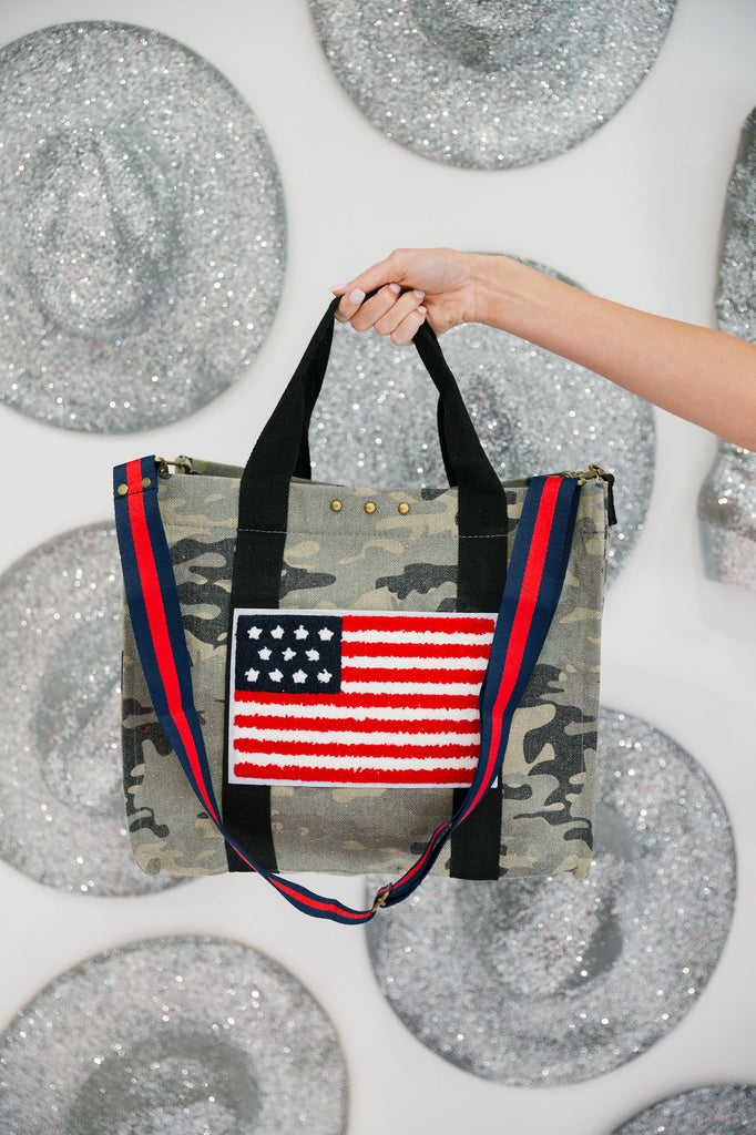 Camo tote bag with an American flag patch