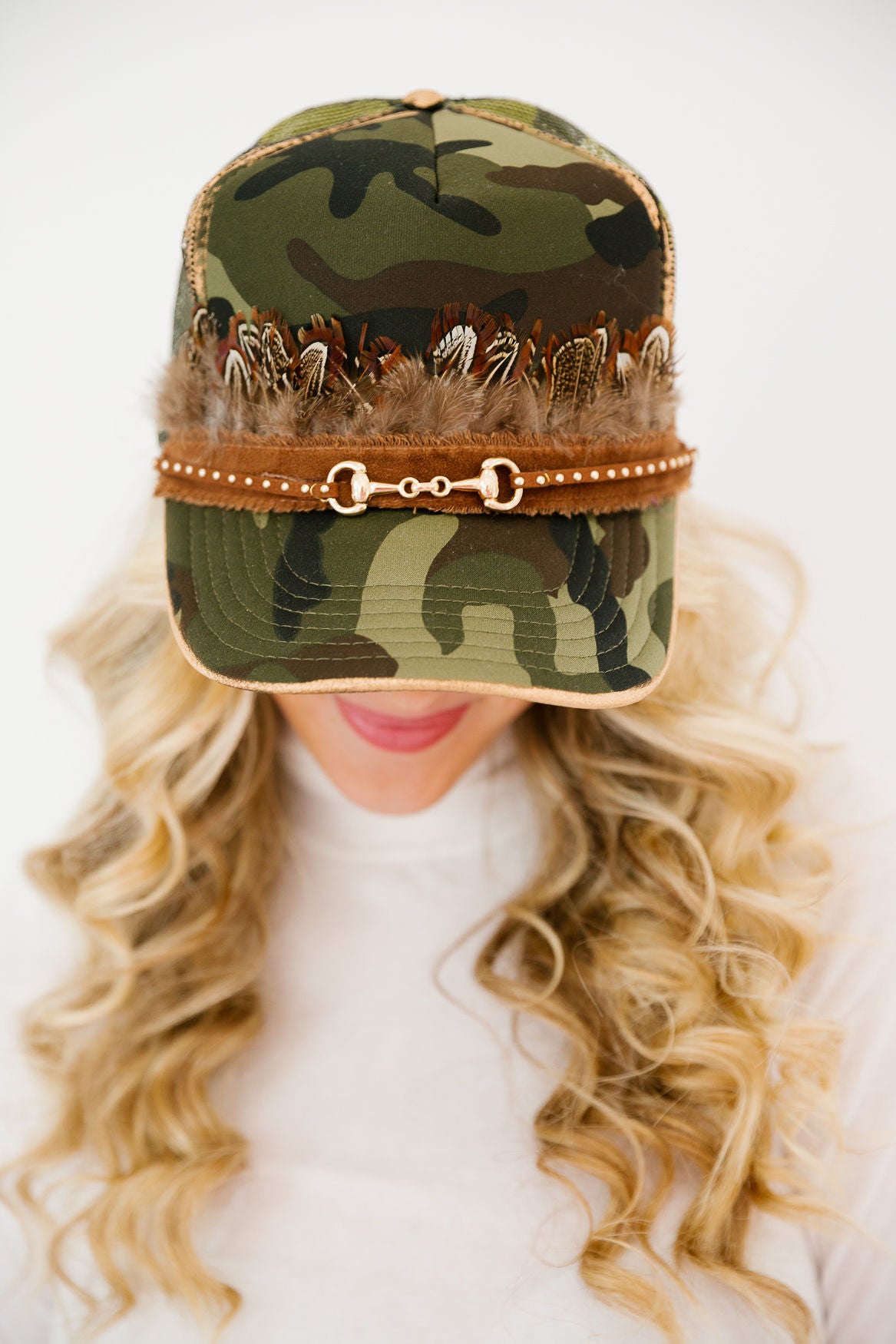 FEATHER HORSE BIT CAMO TRUCKER HAT TRUCKER HAT Judith March