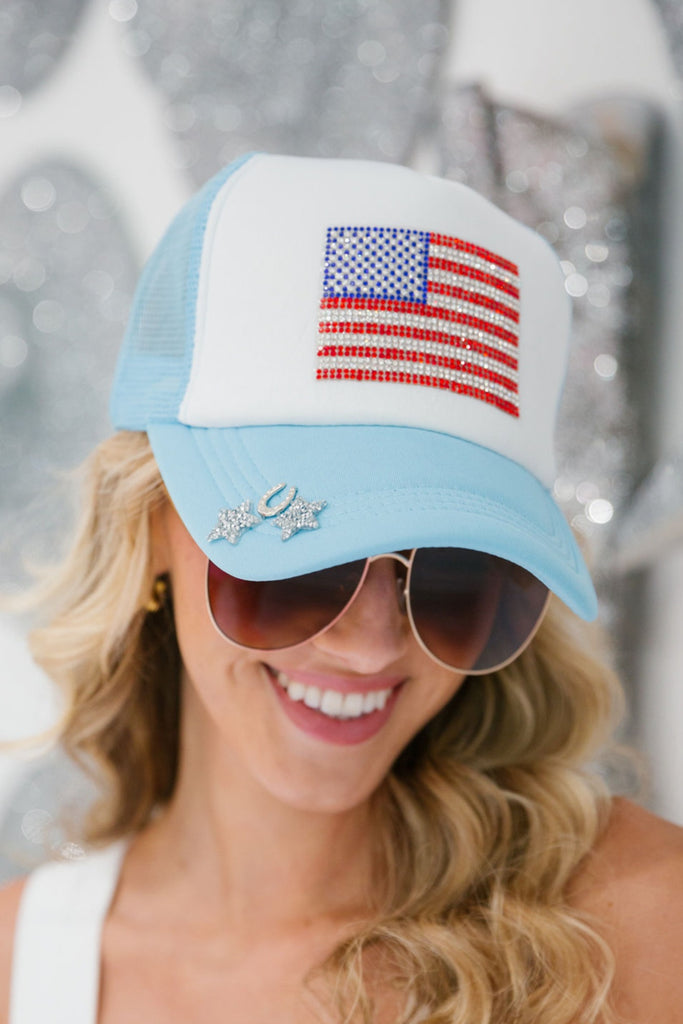 Blue and white trucker hat with American flag