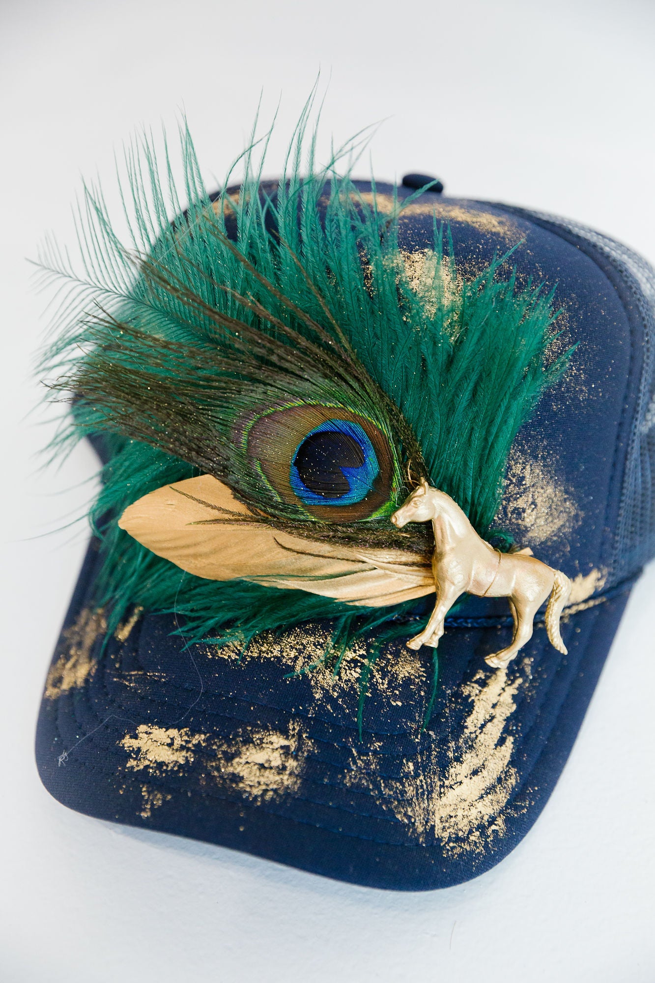 GOLD HORSE VINTAGE FEATHER TRUCKER HAT TRUCKER HAT Judith March