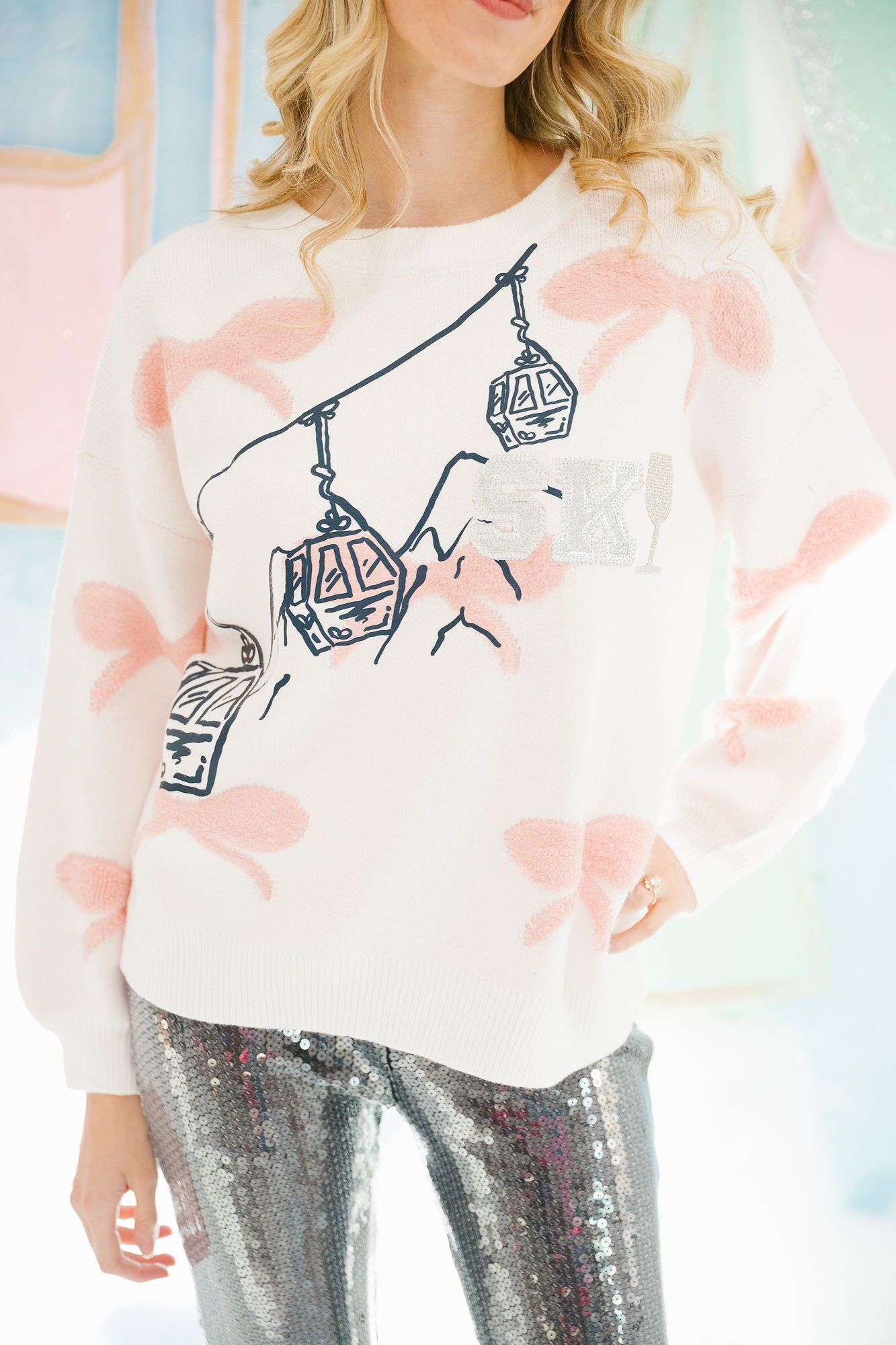 TAKE ME TO THE MOUNTAINS PINK BOW SWEATER SWEATER Judith March