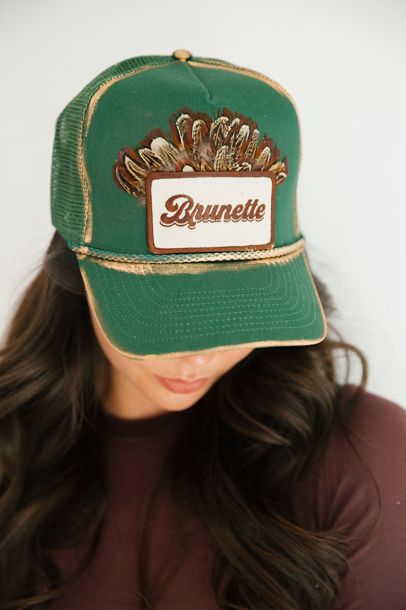 BRUNETTE FEATHER GREEN STRUCTURED HAT TRUCKER HAT Judith March