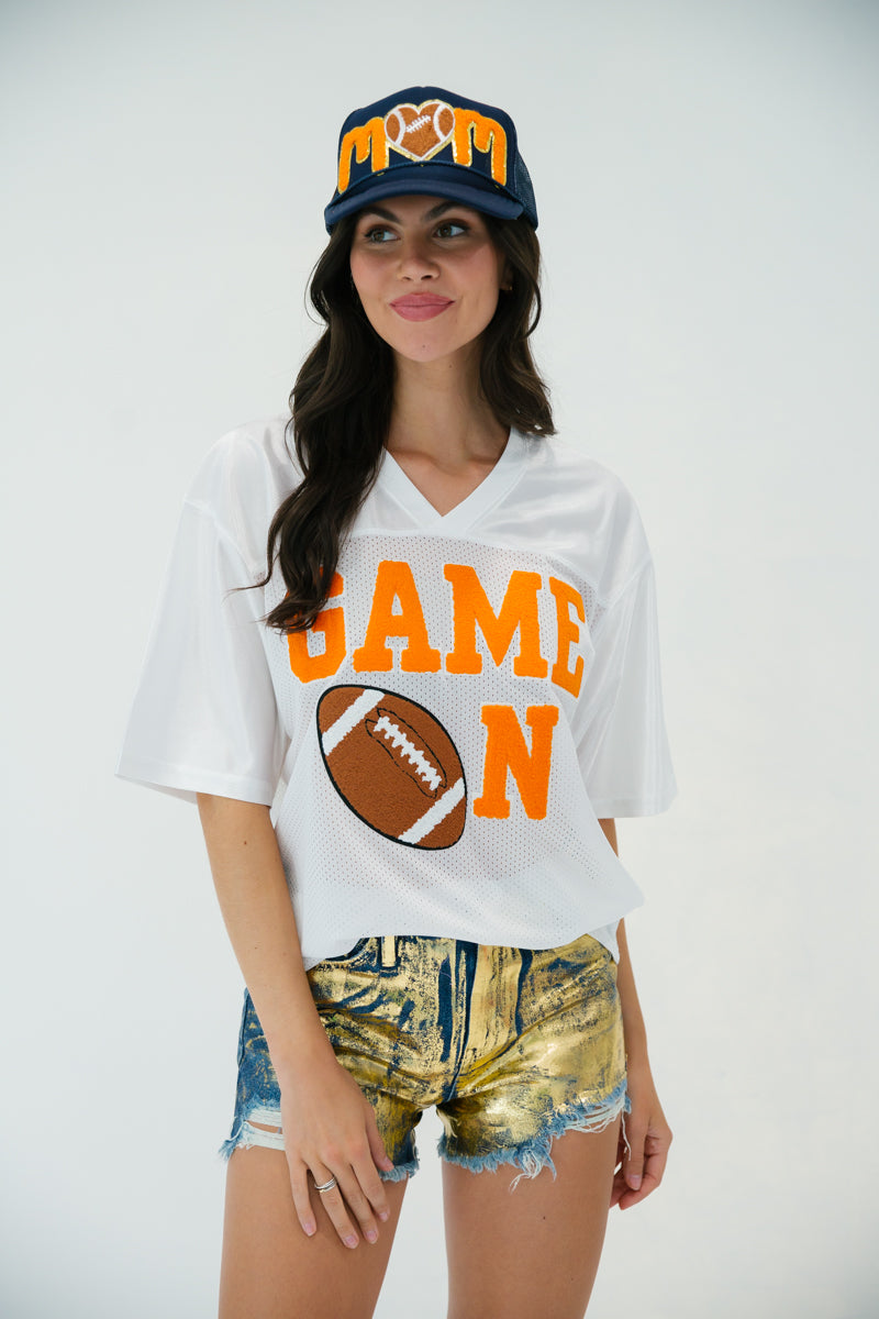 GAME ON JERSEY WITH ORANGE VARSITY gameday23 Judith March
