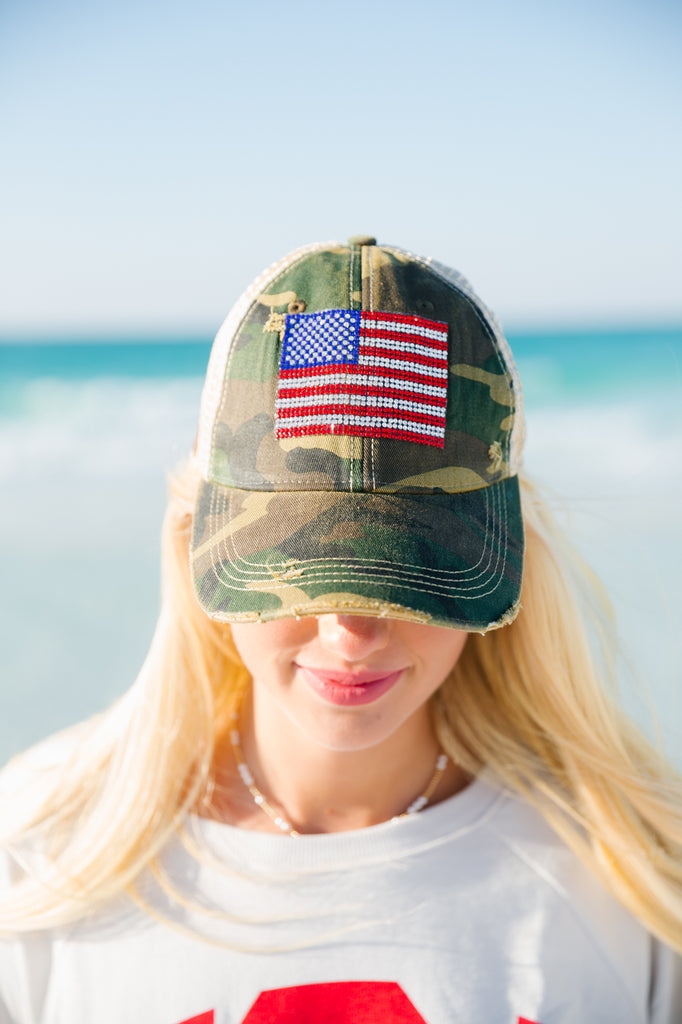 Camo baseball hat with American flag patch