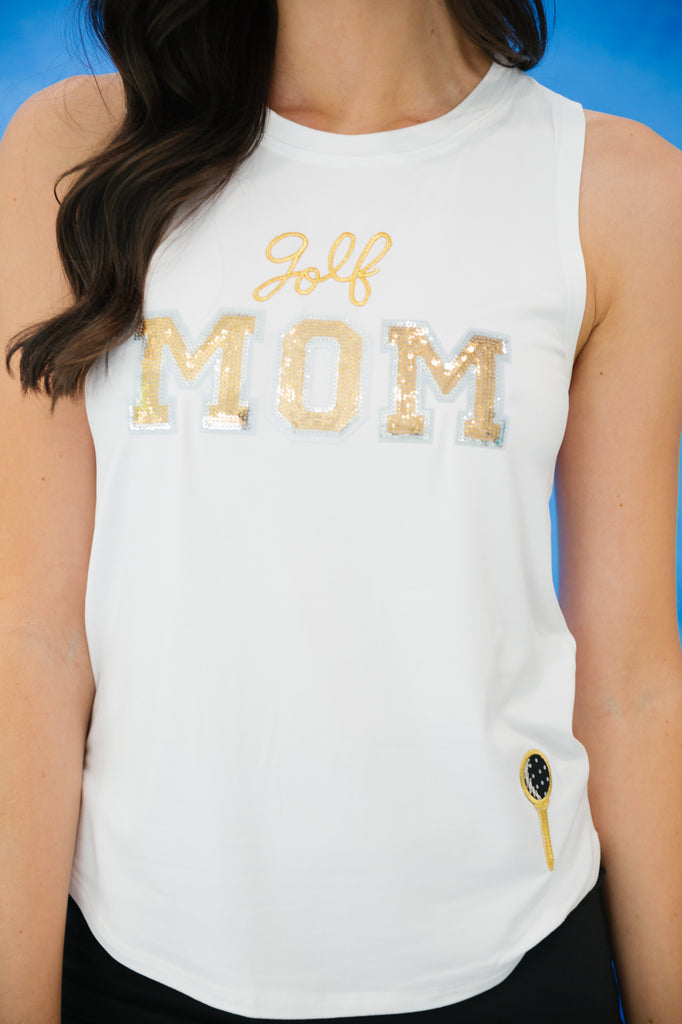 White tank with "golf mom" in gold lettering with golf patch on the left hip. 
