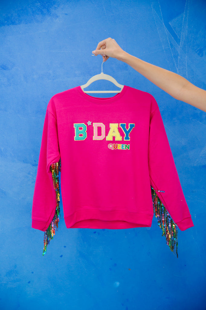 Kids pink pullover with "bday queen" patch and multi colored sequin fringe. 