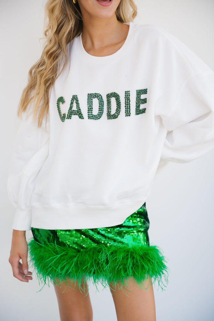 White cropped pullover with Caddie in green diamond letters