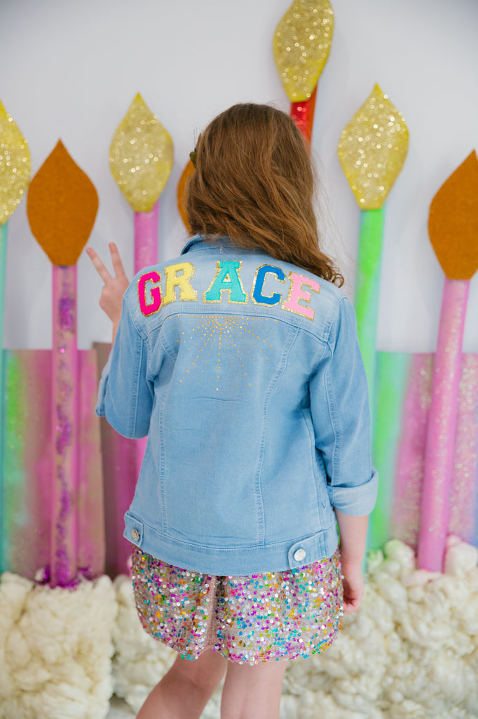Denim jacket with your name customized to your preference and patches of your choice!