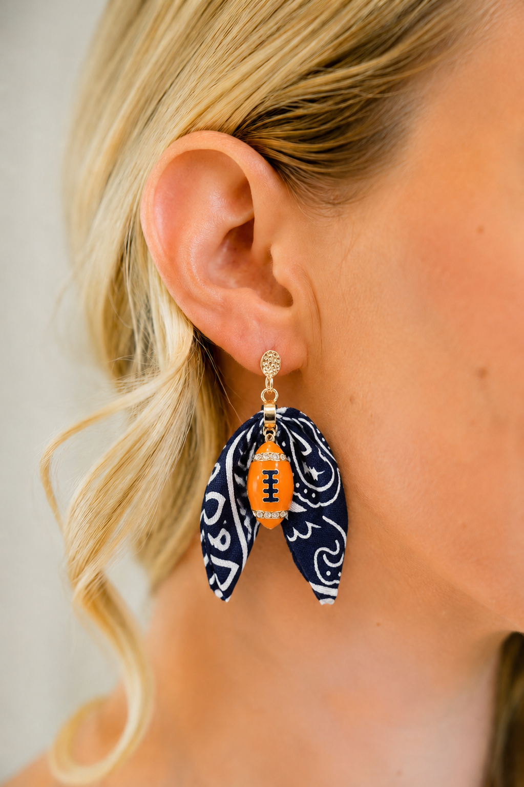 FOOTBALL NAVY BOW EARRINGS