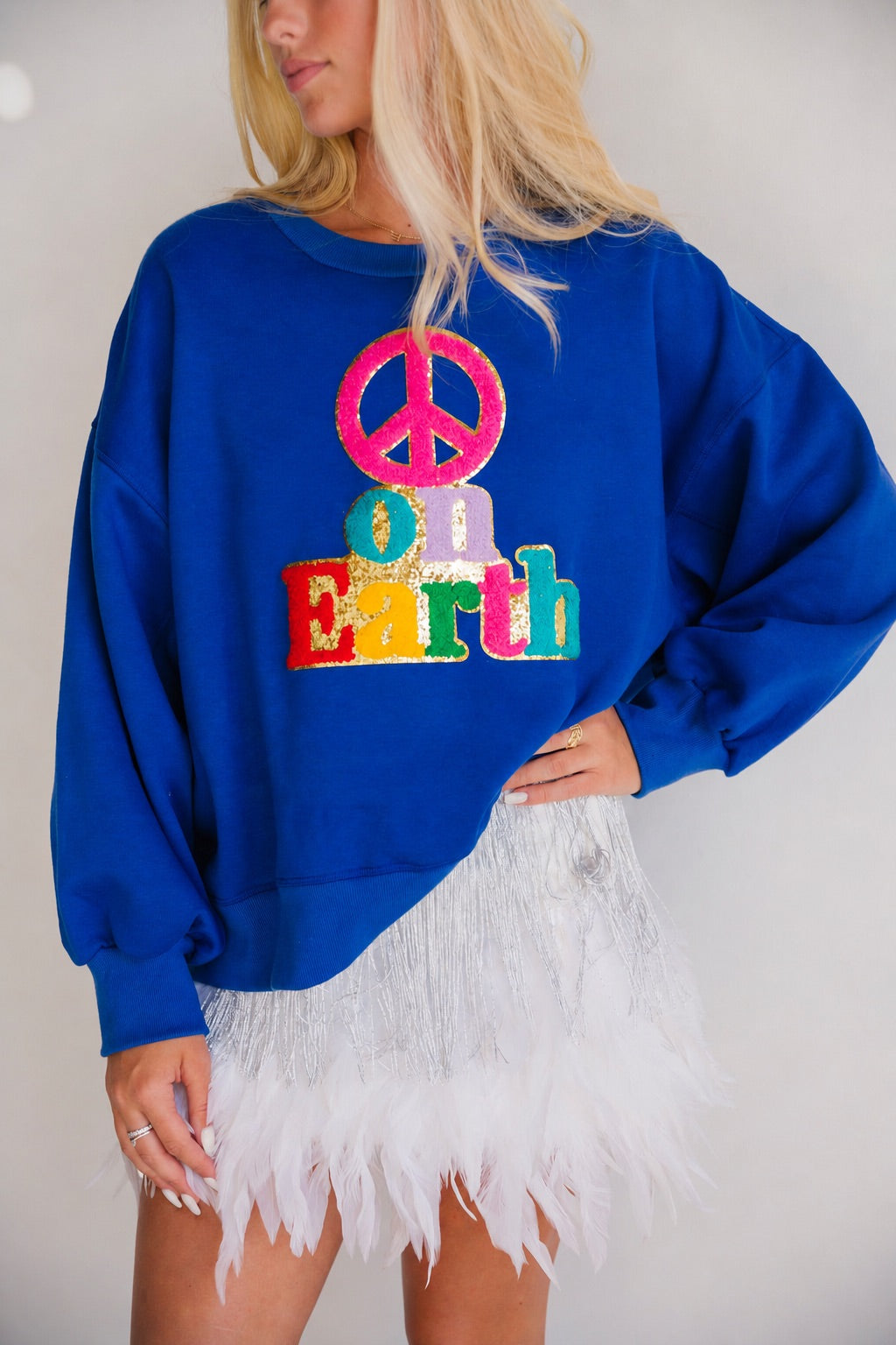 **PEACE ON EARTH ROYAL PULLOVER - L/XL PULLOVER Judith March
