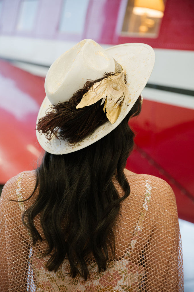 Ivory rancher hat with feathers