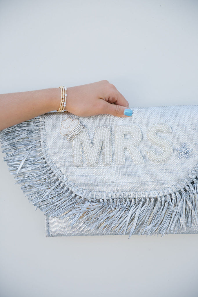 Silver straw clutch with "Mrs" and beaded cowboy hat patch. 