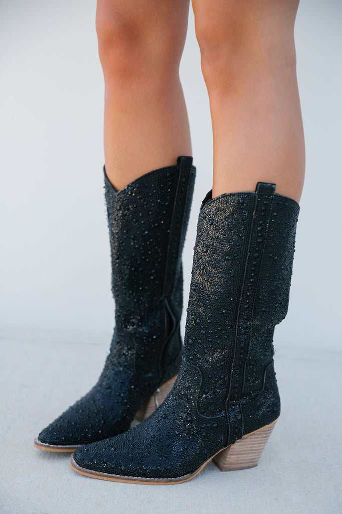 Black rhinestone boots. 