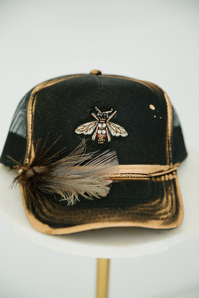 GOLDEN BEE BLACK TRUCKER HAT