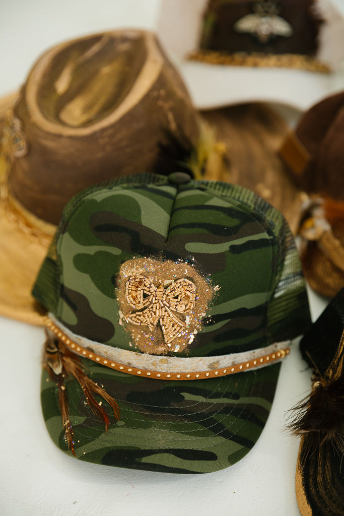 GOLDEN BOW CAMO TRUCKER HAT TRUCKER HAT Judith March   