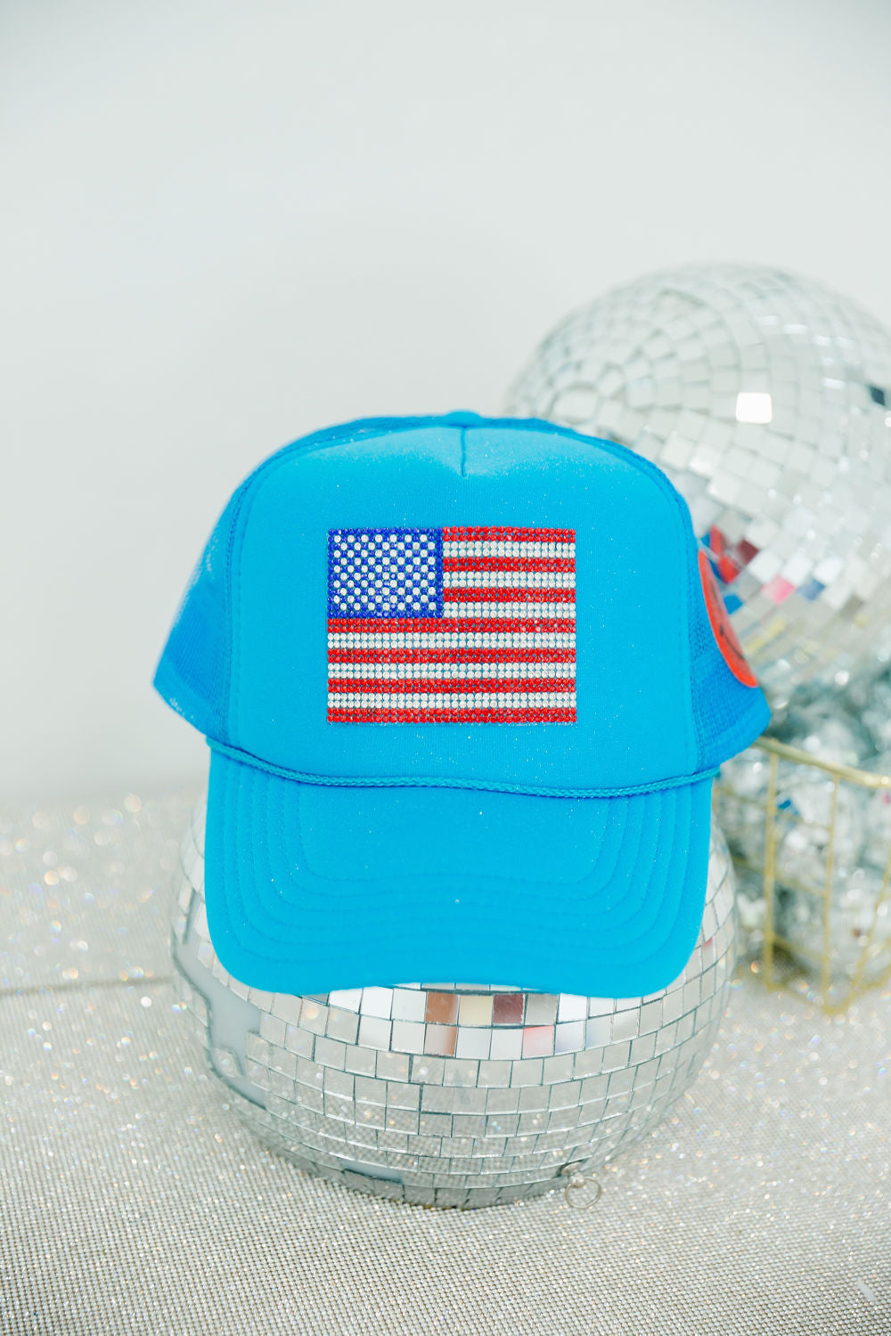 RHINESTONE FLAG BLUE TRUCKER HAT TRUCKER HAT Judith March