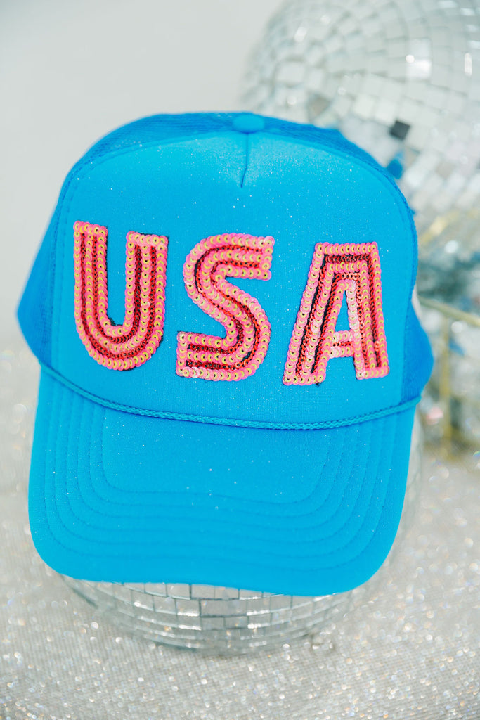 Blue trucker hat with pink sequin "USA" letters
