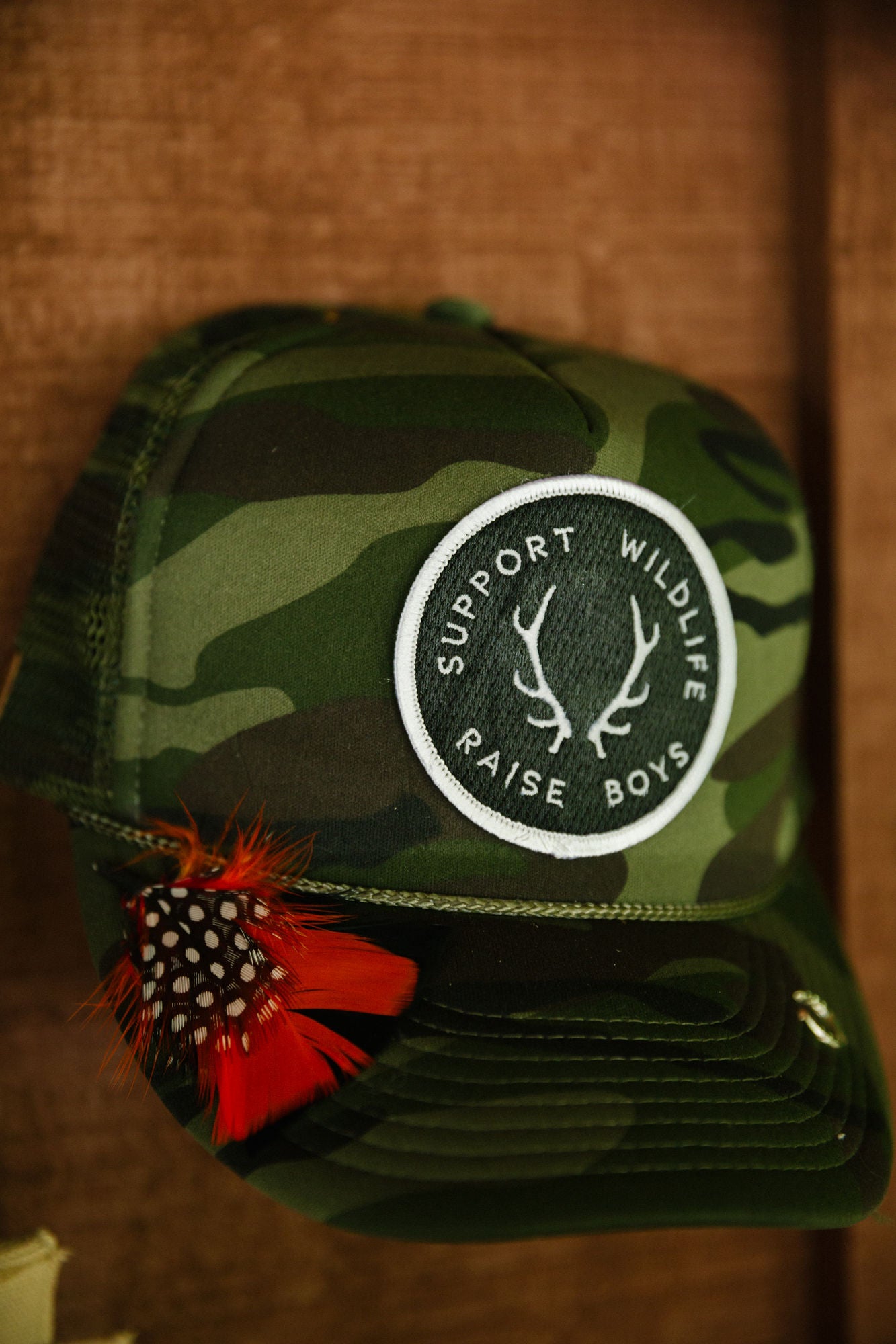 SUPPORT WILDLIFE RAISE BOYS CAMO TRUCKER HAT TRUCKER HAT Judith March   