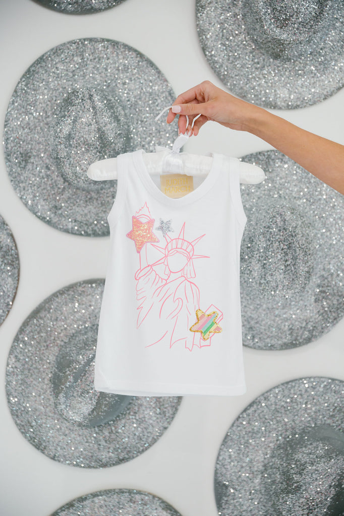 Kids white tank top with pink Lady Liberty print and star patches