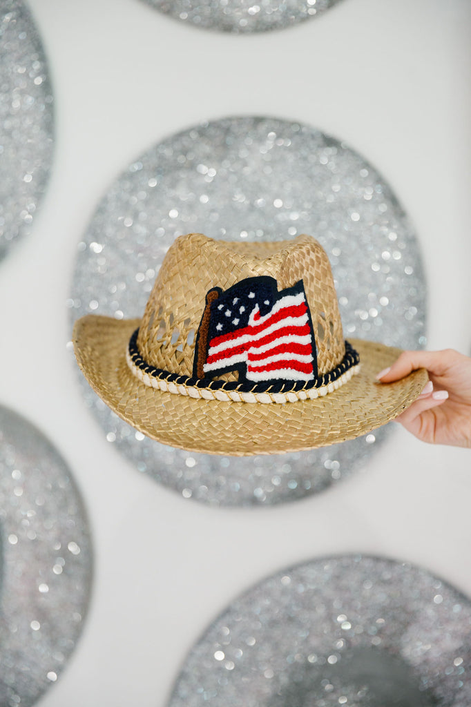 Kids straw cowboy hat with an American flag