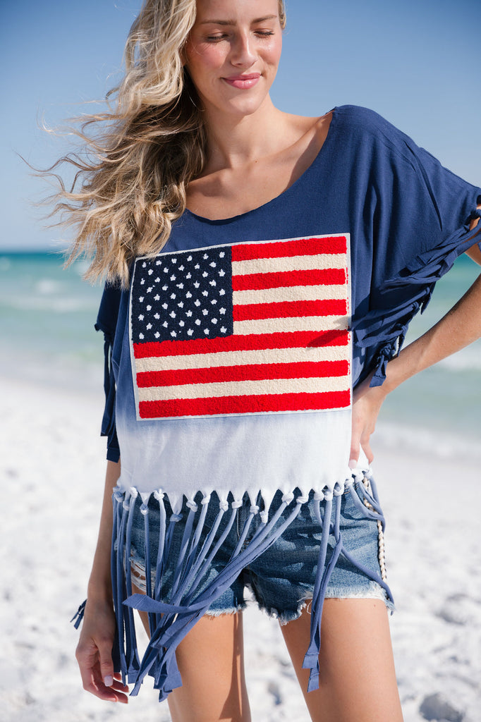 Navy tie dye fringe t-shirt with an American flag