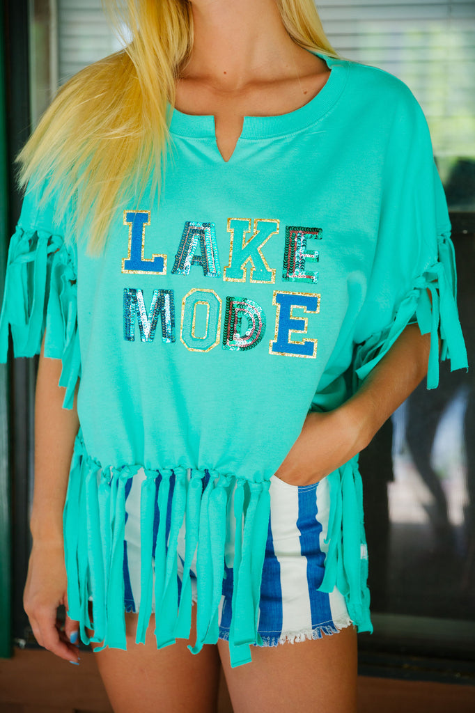 Mint fringe tee with Lake Mode in blue, turquoise, and sequin lettering