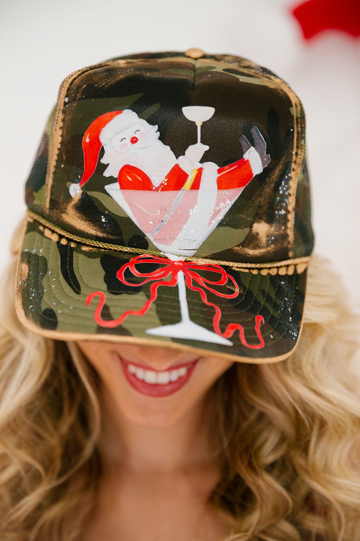 TIPSY SANTA CAMO TRUCKER HAT TRUCKER HAT Judith March