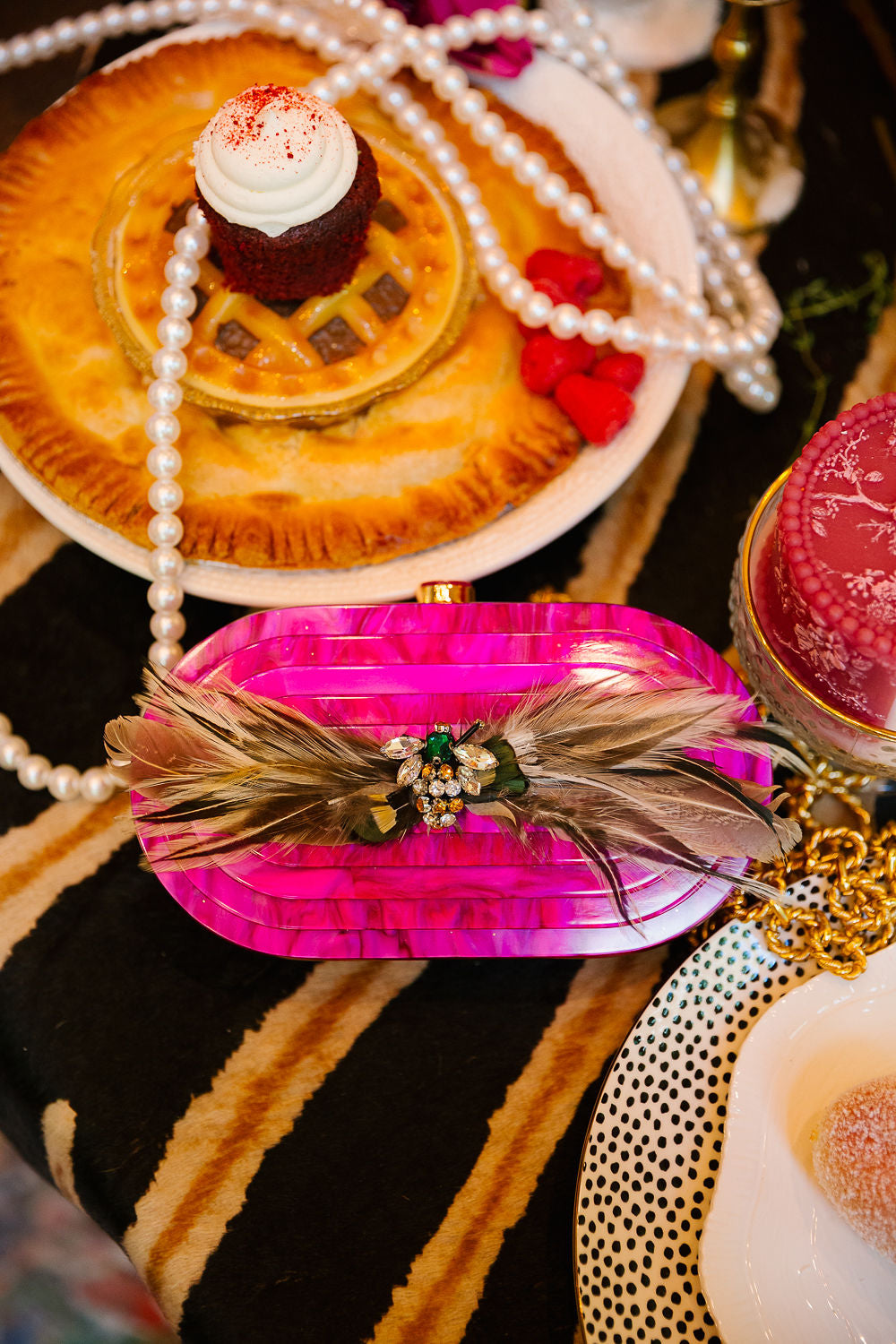 GILDED WINGS PINK CLUTCH BAG Judith March