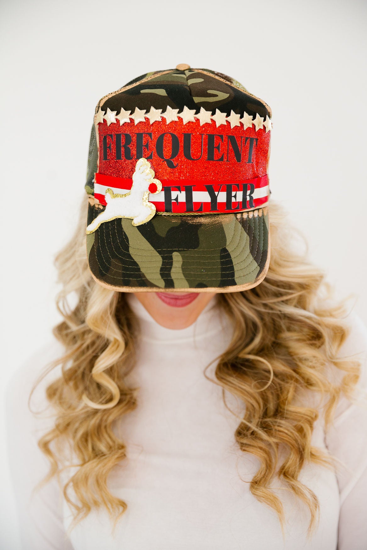 FREQUENT FLYER STAR CAMO TRUCKER HAT TRUCKER HAT Judith March