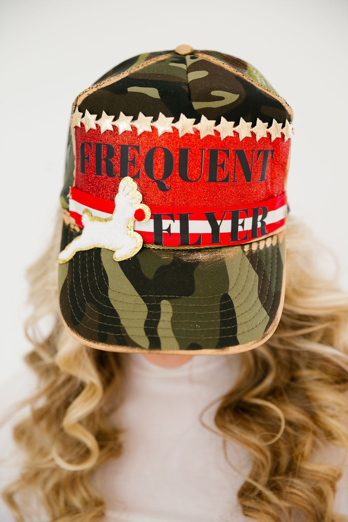 FREQUENT FLYER STAR CAMO TRUCKER HAT TRUCKER HAT Judith March