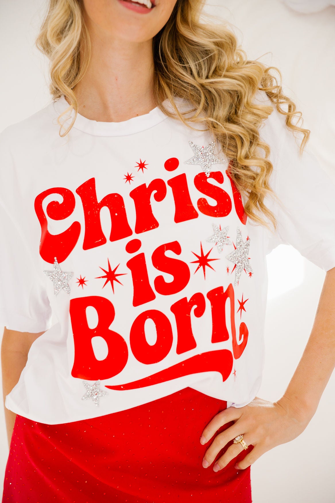 CHRIST IS BORN TEE TEE Judith March