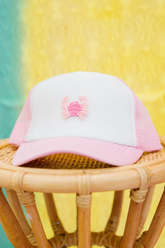 Kids white and pink trucker hat with a pink knit crab patch