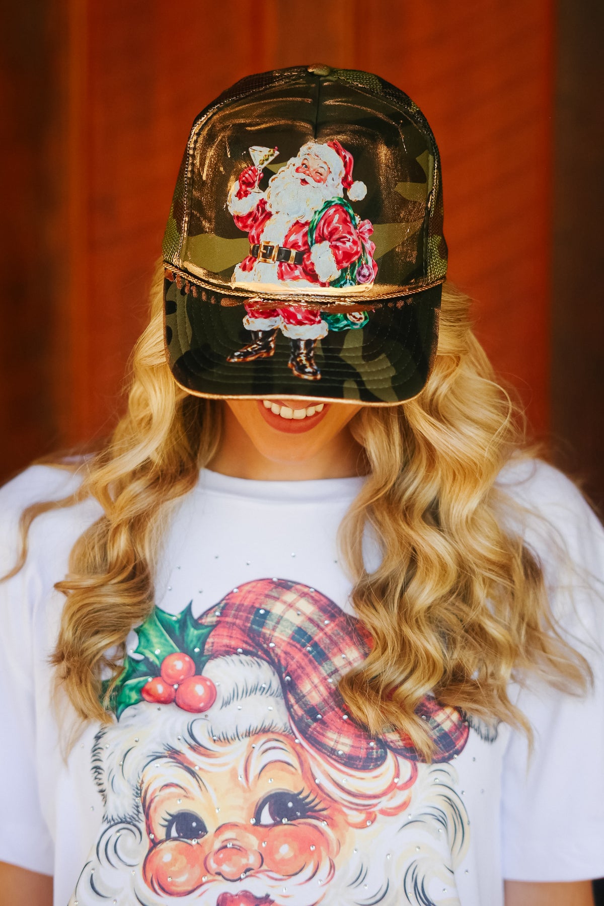 SANTA CLAUS SIPS CAMO TRUCKER HAT TRUCKER HAT Judith March