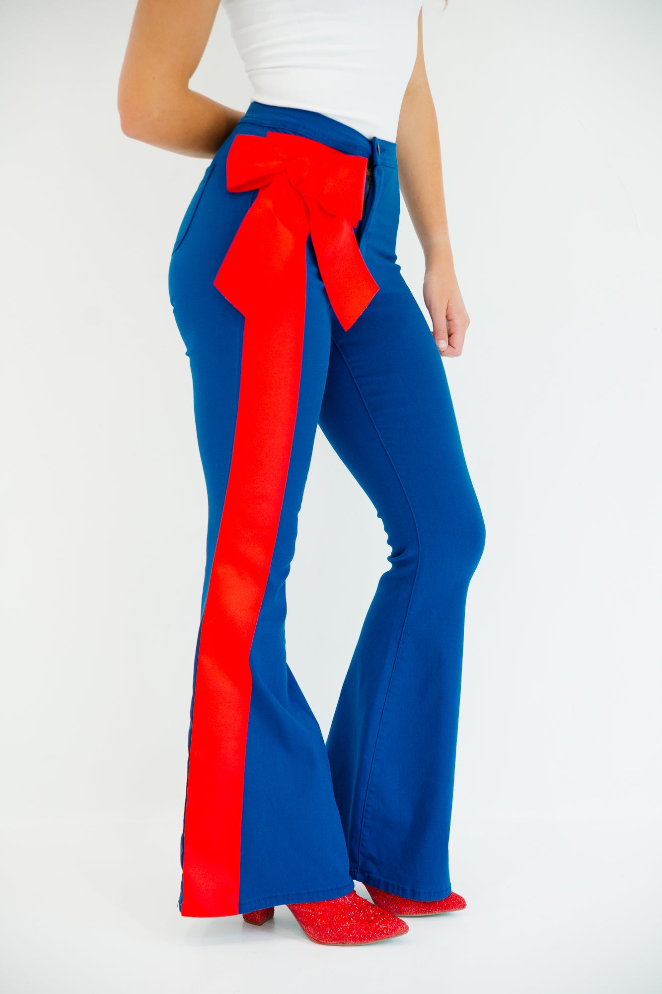 IT'S GAMEDAY FLARES FLARES Judith March SMALL DARK BLUE WITH RED BOW