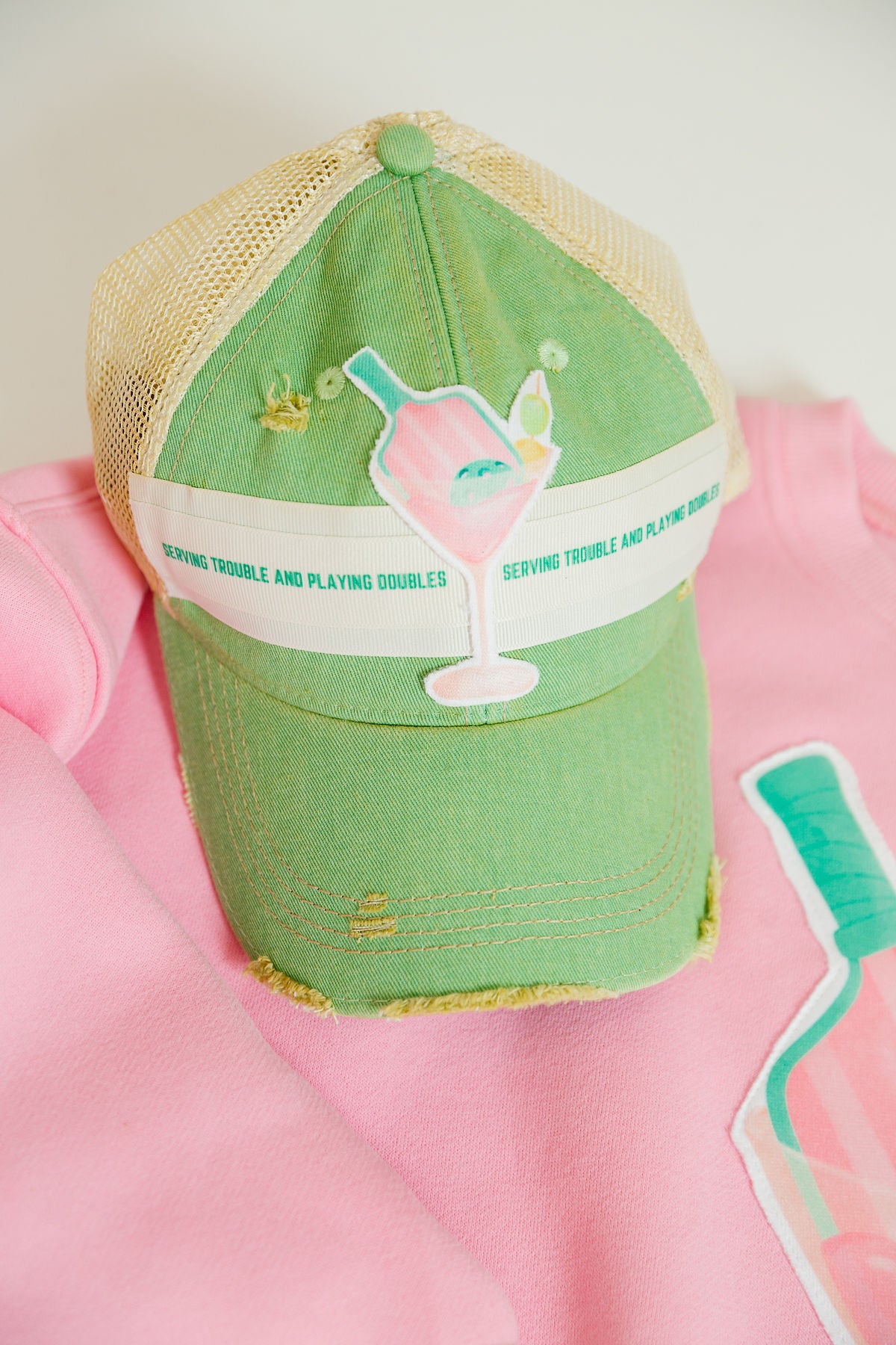 SERVING TROUBLE GREEN DISTRESSED HAT HAT Judith March   