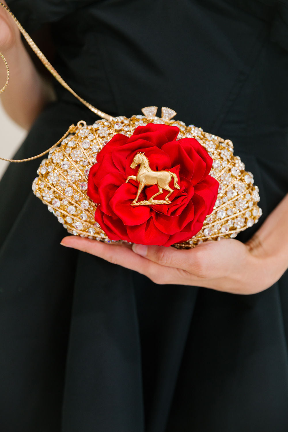 WINNER'S ROSE GOLD CLUTCH BAG Judith March