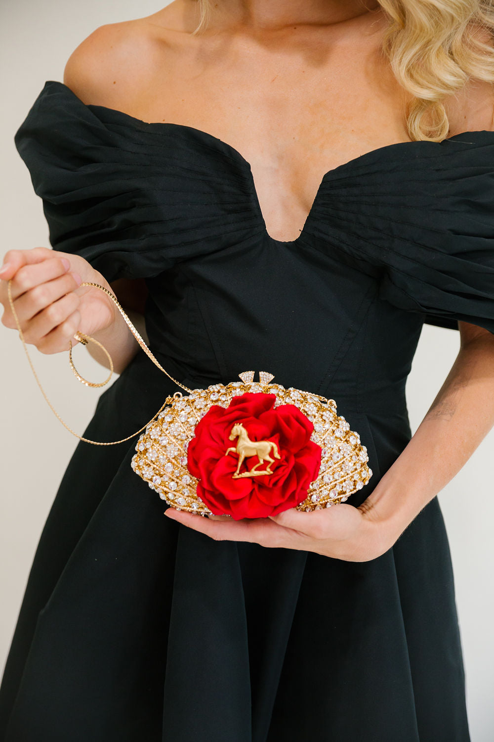 WINNER'S ROSE GOLD CLUTCH BAG Judith March