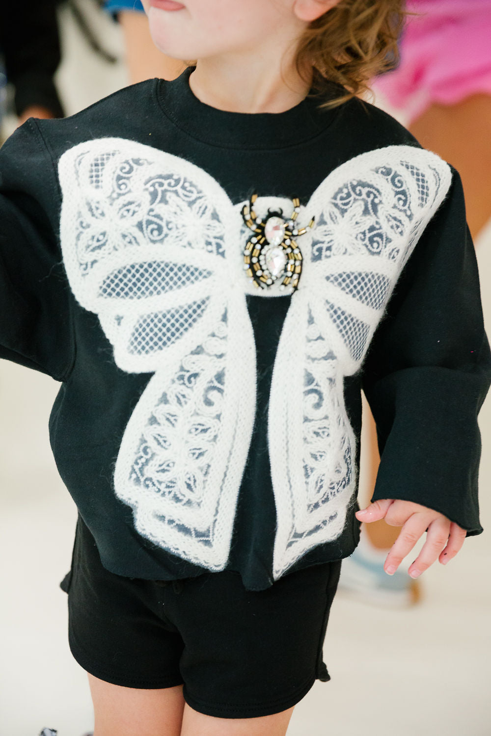 MINI KIDS SPIDER BOW BLACK PULLOVER PULLOVER Judith March