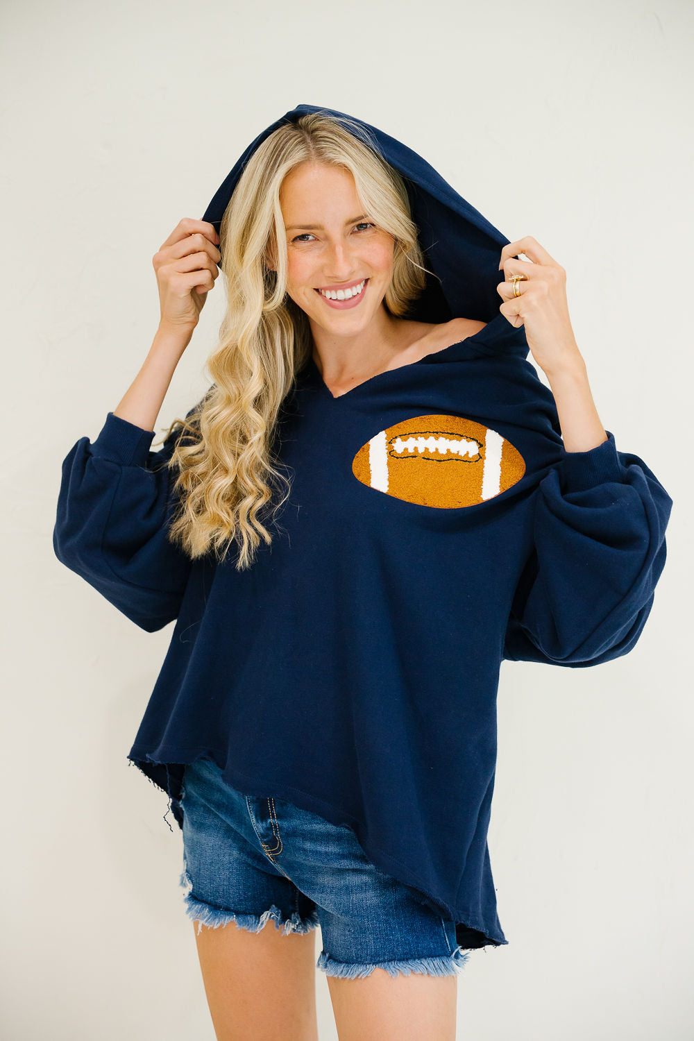 **FOOTBALL NAVY HOODED PULLOVER - L/XL PULLOVER Judith March