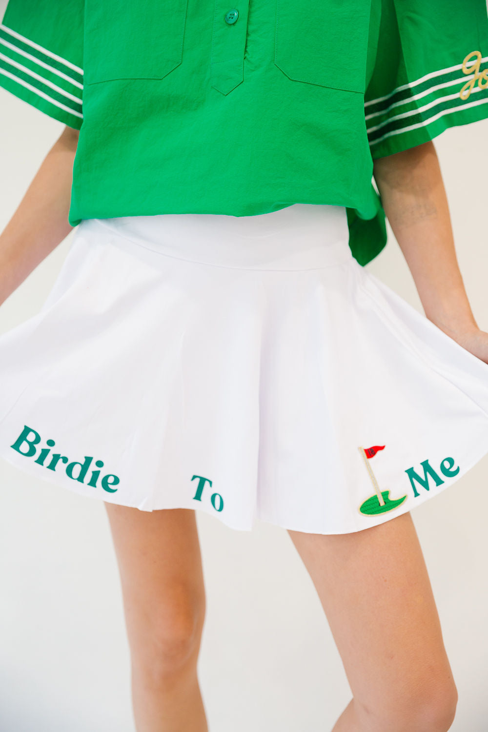 *WHITE TALK BIRDIE TO ME ATHLETIC SKIRT - MEDIUM SKIRT Judith March