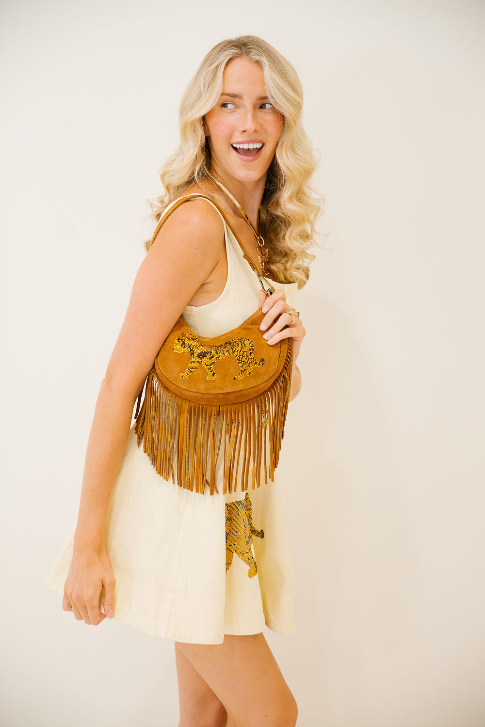 GOLDEN ROAR FRINGE HANDBAG Clutch Judith March