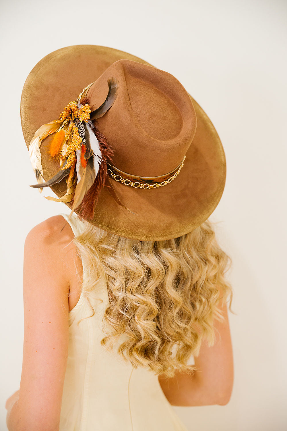 THE FEATHERED FRONTIER RANCHER HAT
