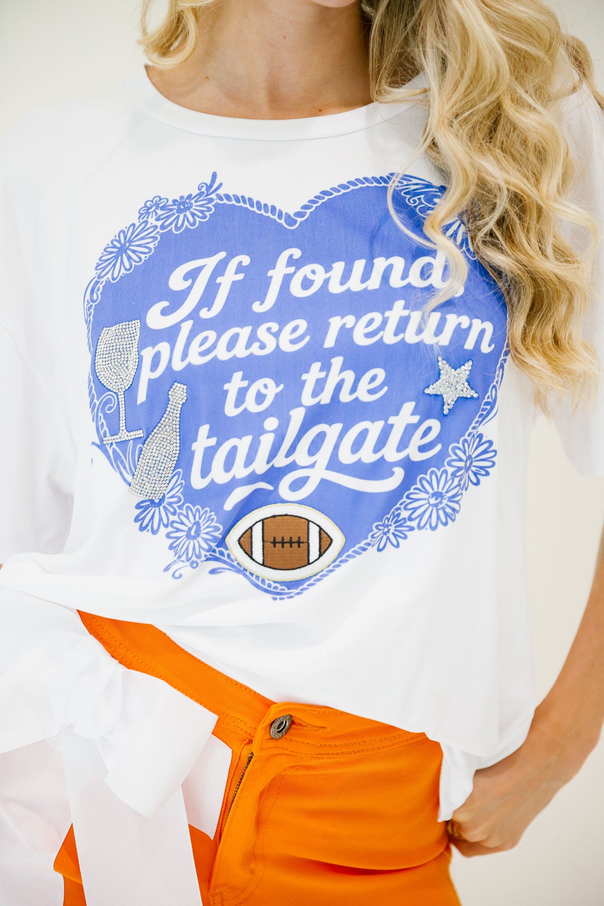 IF FOUND, RETURN TO TAILGATE BLUE TEE