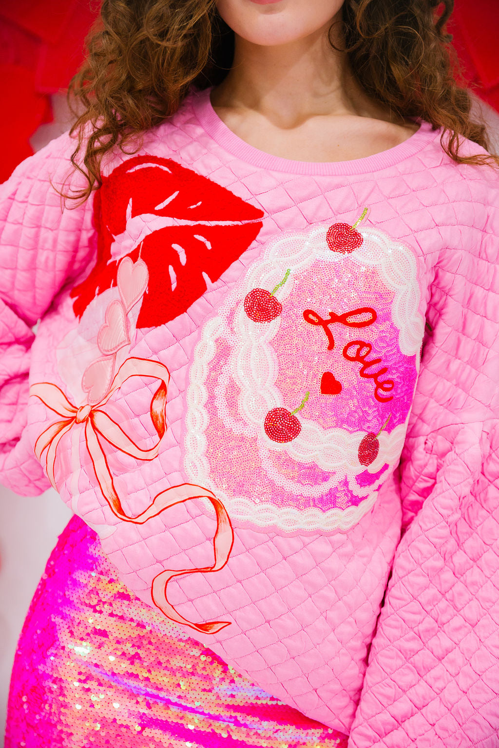 BLUSH & BOWS QUILTED PULLOVER