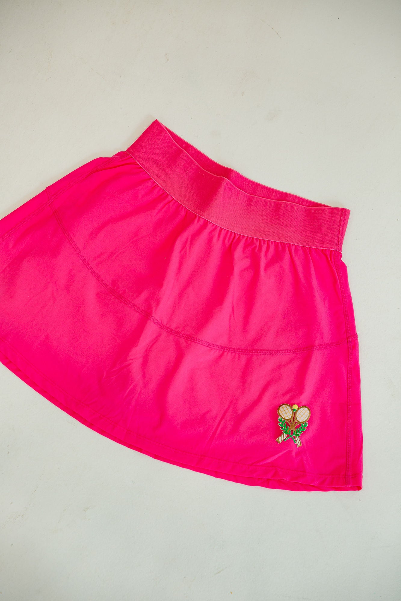 *TENNIS PATCH PINK SKIRT - SMALL FLARES Judith March