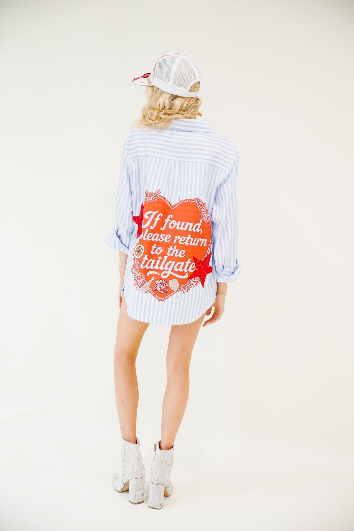 IF FOUND, PLEASE RETURN TO TAILGATE BLUE BUTTON DOWN