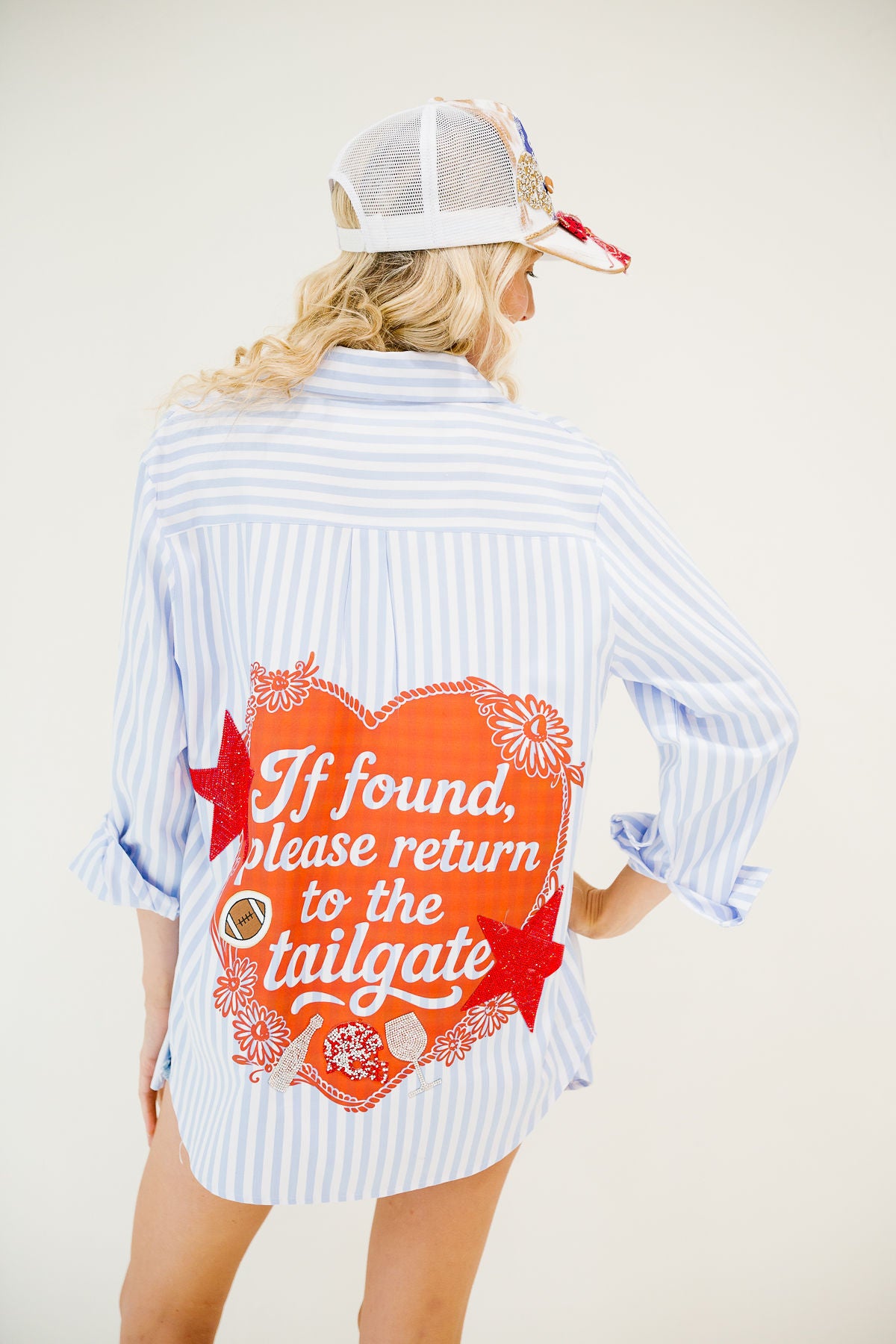 IF FOUND, PLEASE RETURN TO TAILGATE BLUE BUTTON DOWN